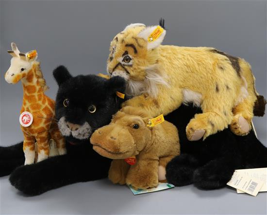 Four Steiff yellow tag toys: Manni Lynx, Gori Giraffe, Fahy Panther and Rhino Hippo